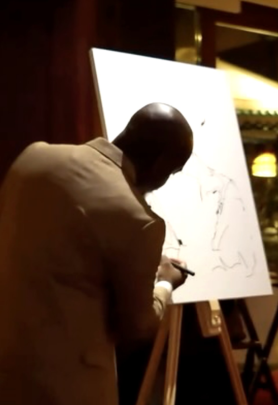 Artiste dessinant en direct lors d’un événement